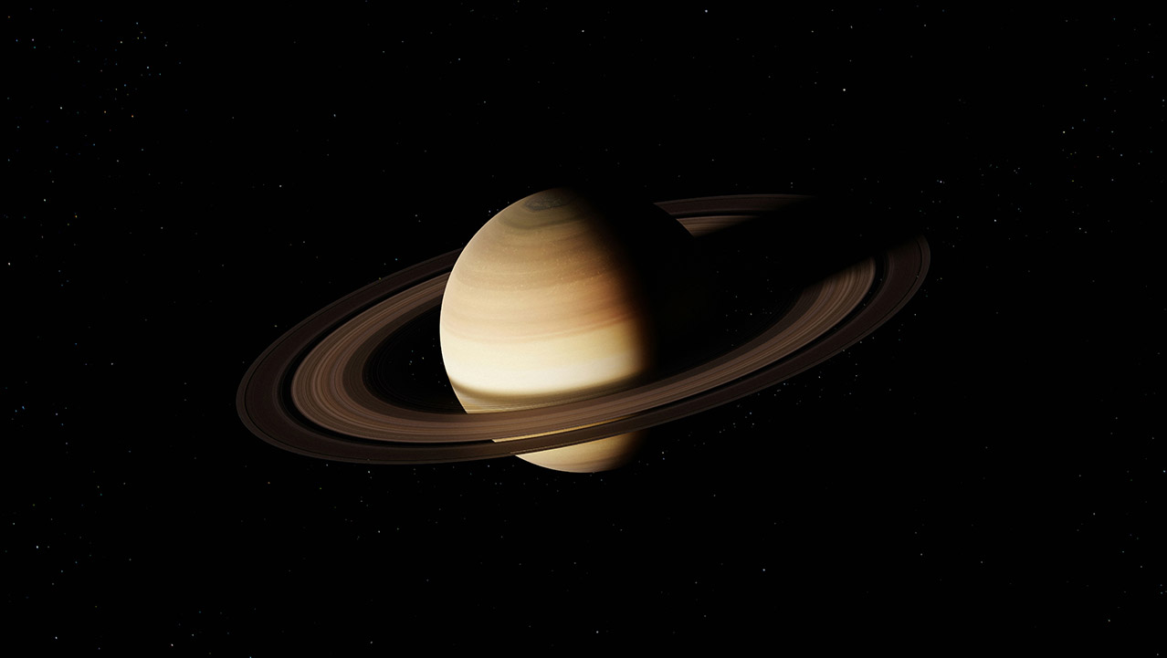 在漆黑深空中帶有清晰環狀結構的恆星，星球表面呈現黃褐色條紋。